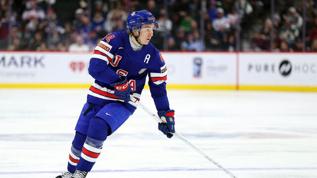 ST PAUL, MINNESOTA - DECEMBER 26: Cole Hutson #44 of the United States skates with the puck against Germany in the third period of a group stage game at Grand Casino Arena on December 26, 2025 in St Paul, Minnesota. The United States defeated Germany 6-3.