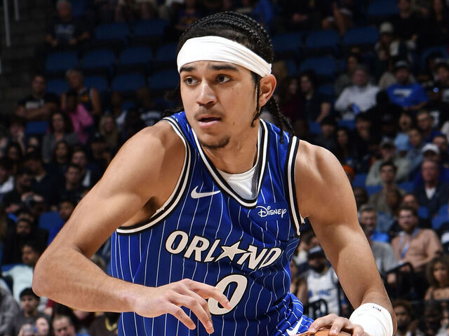 ORLANDO, FL - DECEMBER 27: Anthony Black #0 of the Orlando Magic drives to the basket during the game against the Denver Nuggets on December 27, 2025 at Kia Center in Orlando, Florida. Mandatory Copyright Notice: Copyright 2025 NBAE