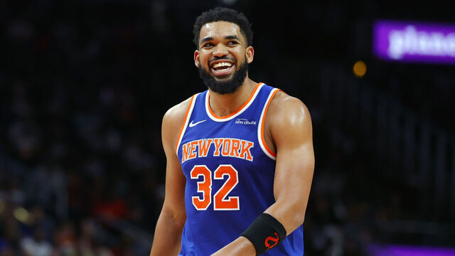 ATLANTA, GEORGIA - DECEMBER 27: Karl-Anthony Towns #32 of the New York Knicks reacts after a three pointer during the fourth quarter against the Atlanta Hawks at State Farm Arena on December 27, 2025 in Atlanta, Georgia.