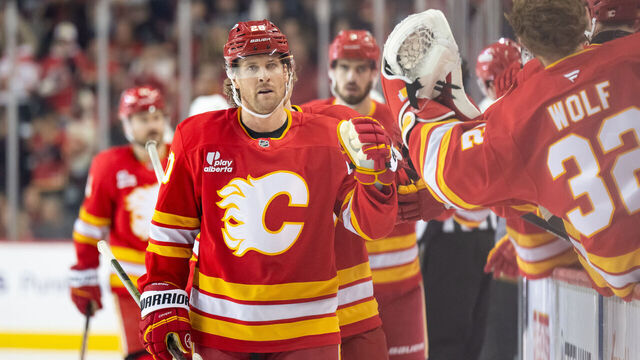CALGARY, CANADA - DECEMBER 20: Blake Coleman #20 of the Calgary Flames celebrates a goal by his team against the Vegas Golden Knights during the first period at the Scotiabank Saddledome on December 20, 2025 in Calgary, Canada.