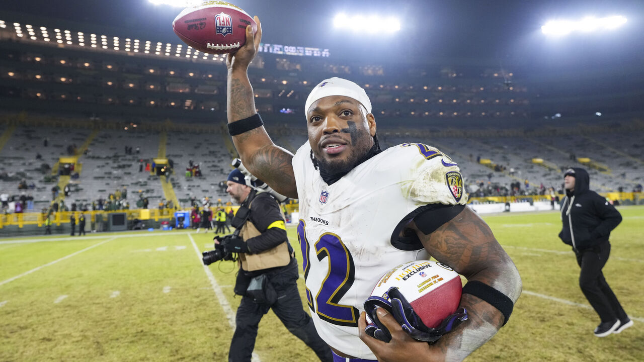 GREEN BAY, WISCONSIN - DECEMBER 27: Derrick Henry #22 of the Baltimore Ravens celebrates after an NFL football game against the Green Bay Packers at Lambeau Field on December 27, 2025 in Green Bay, Wisconsin.