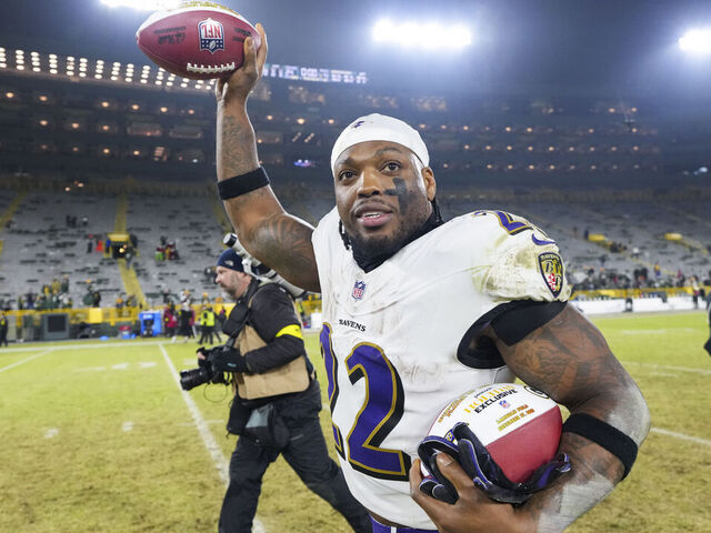 GREEN BAY, WISCONSIN - DECEMBER 27: Derrick Henry #22 of the Baltimore Ravens celebrates after an NFL football game against the Green Bay Packers at Lambeau Field on December 27, 2025 in Green Bay, Wisconsin.