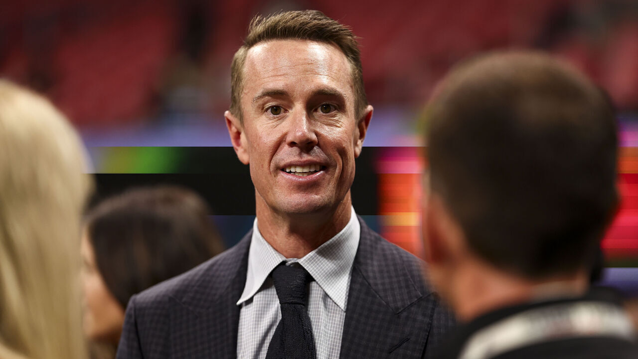 ATLANTA, GEORGIA - OCTOBER 3: Former Atlanta Falcons quarterback Matt Ryan smiles on the sidelines prior to an NFL football game against the Tampa Bay Buccaneers at Mercedes-Benz Stadium on October 3, 2024 in Atlanta, Georgia.