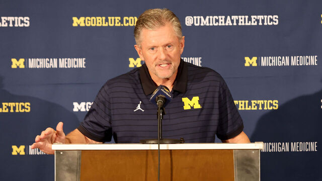 ORLANDO, FLORIDA - DECEMBER 28: Kyle Whittingham speaks at a news conference introducing him as the new Michigan Wolverines head football coach at the Hyatt Regency Orlando on December 28, 2025 in Orlando, Florida.