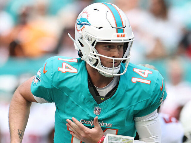 MIAMI GARDENS, FLORIDA - DECEMBER 28: Quinn Ewers #14 of the Miami Dolphins rolls out during the first quarter against the Tampa Bay Buccaneers at Hard Rock Stadium on December 28, 2025 in Miami Gardens, Florida.