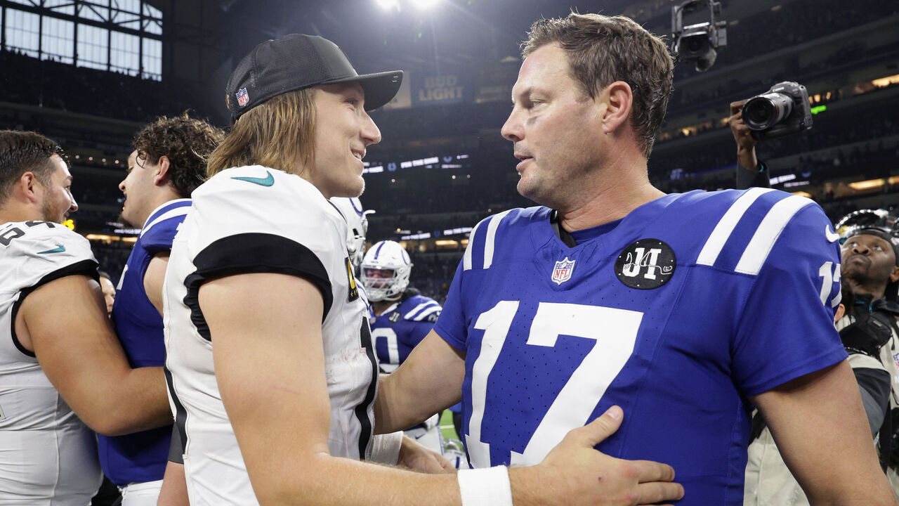 INDIANAPOLIS, INDIANA - DECEMBER 28: Trevor Lawrence #16 of the Jacksonville Jaguars and Philip Rivers #17 of the Indianapolis Colts interact after the Jacksonville Jaguars won the game at Lucas Oil Stadium on December 28, 2025 in Indianapolis, Indiana. The Jacksonville Jaguars defeated the Indianapolis Colts 23-17.
