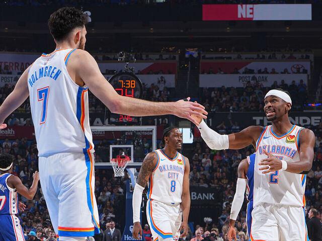 OKLAHOMA CITY, OK - DECEMBER 28: Chet Holmgren #7 and Shai Gilgeous-Alexander #2 of the Oklahoma City Thunder high five during the game against the Philadelphia 76ers on December 28, 2025 at Paycom Center in Oklahoma City, Oklahoma. Mandatory Copyright Notice: Copyright 2025 NBAE