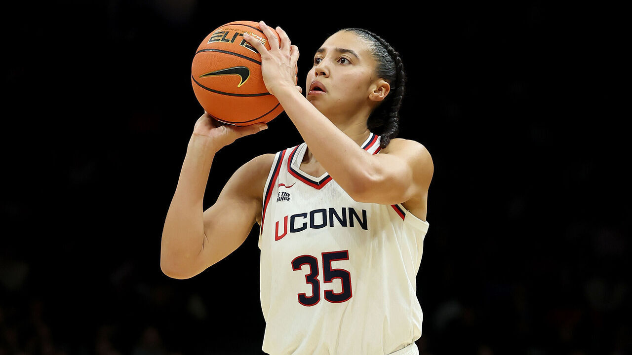 NEW YORK, NEW YORK - DECEMBER 20: Azzi Fudd #35 of the UConn Huskies takes a shot in the second half against the Iowa Hawkeyes during the 2025 Women's Champions Classic at Barclays Center on December 20, 2025 in the Brooklyn borough of New York City.