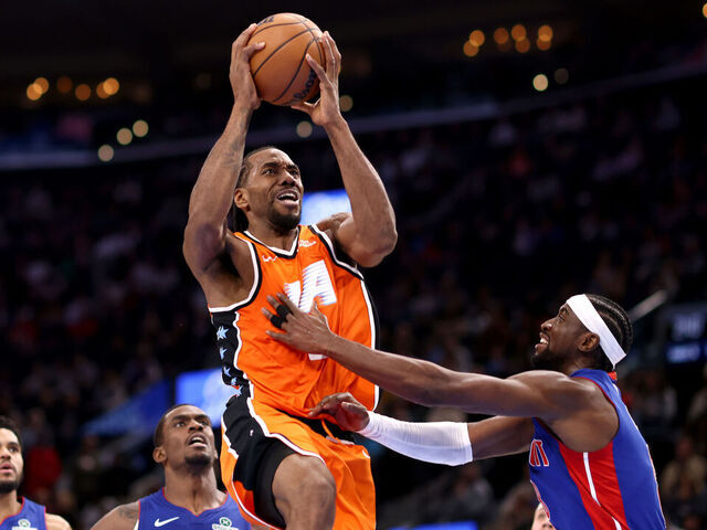 INGLEWOOD, CALIFORNIA - DECEMBER 28: Kawhi Leonard #2 of the Los Angeles Clippers drives to the basket against Caris Levert #8 of the Detroit Pistons during the second quarter at Intuit Dome on December 28, 2025 in Inglewood, California.