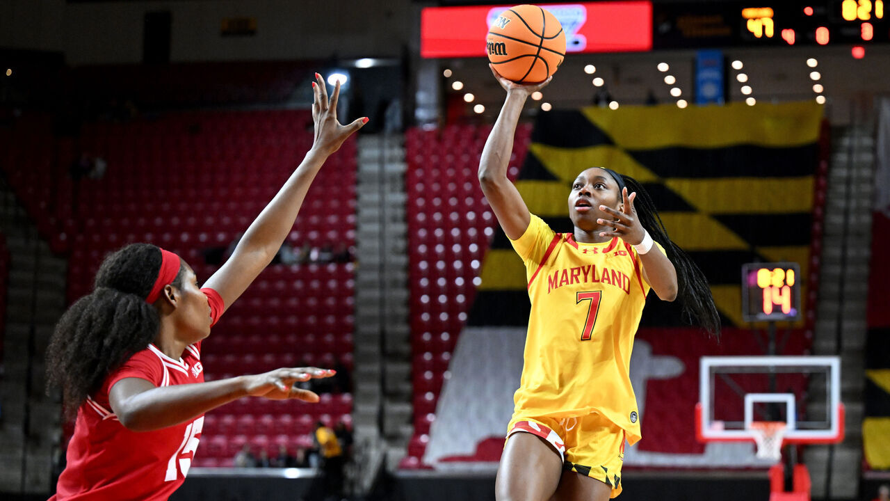 COLLEGE PARK, MARYLAND - DECEMBER 29: Oluchi Okananwa #7 of the Maryland Terrapins shoots the ball in the third quarter against Gift Uchenna #15 of the Wisconsin Badgers at Xfinity Center on December 29, 2025 in College Park, Maryland.