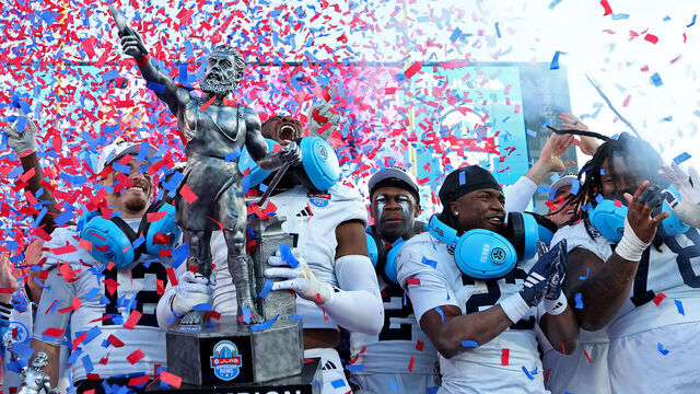 BIRMINGHAM, ALABAMA - DECEMBER 29: Davion Rhodes #91 of the Georgia Southern Eagles holds the JLab Birmingham Bowl Vulcan trophy after beating the Appalachian State Mountaineers 29-10 at Protective Stadium on December 29, 2025 in Birmingham, Alabama.