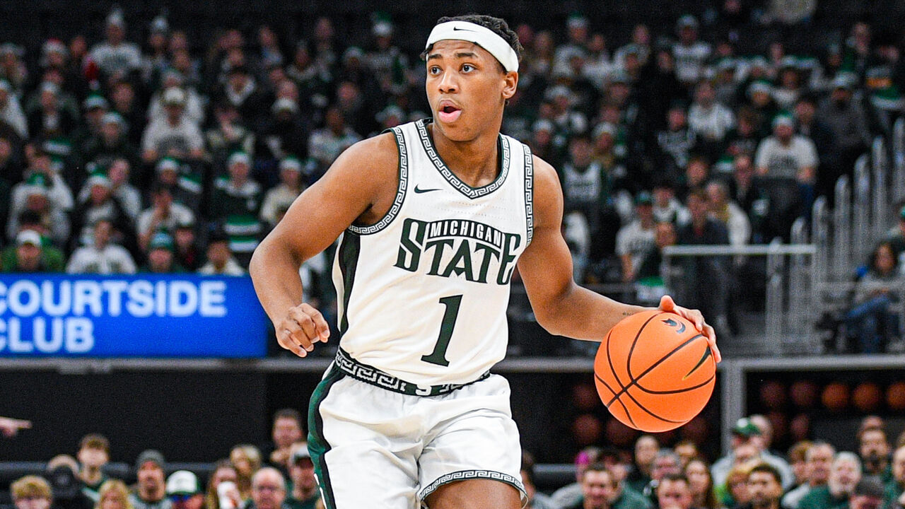 DETROIT, MICHIGAN - DECEMBER 20: Jeremy Fears Jr. #1 of the Michigan State Spartans dribbles the ball up court during the first half of the college basketball game against the Oakland Golden Grizzlies at Little Caesars Arena on December 20, 2025 in Detroit, Michigan. The Michigan State Spartans won the game 79-70.