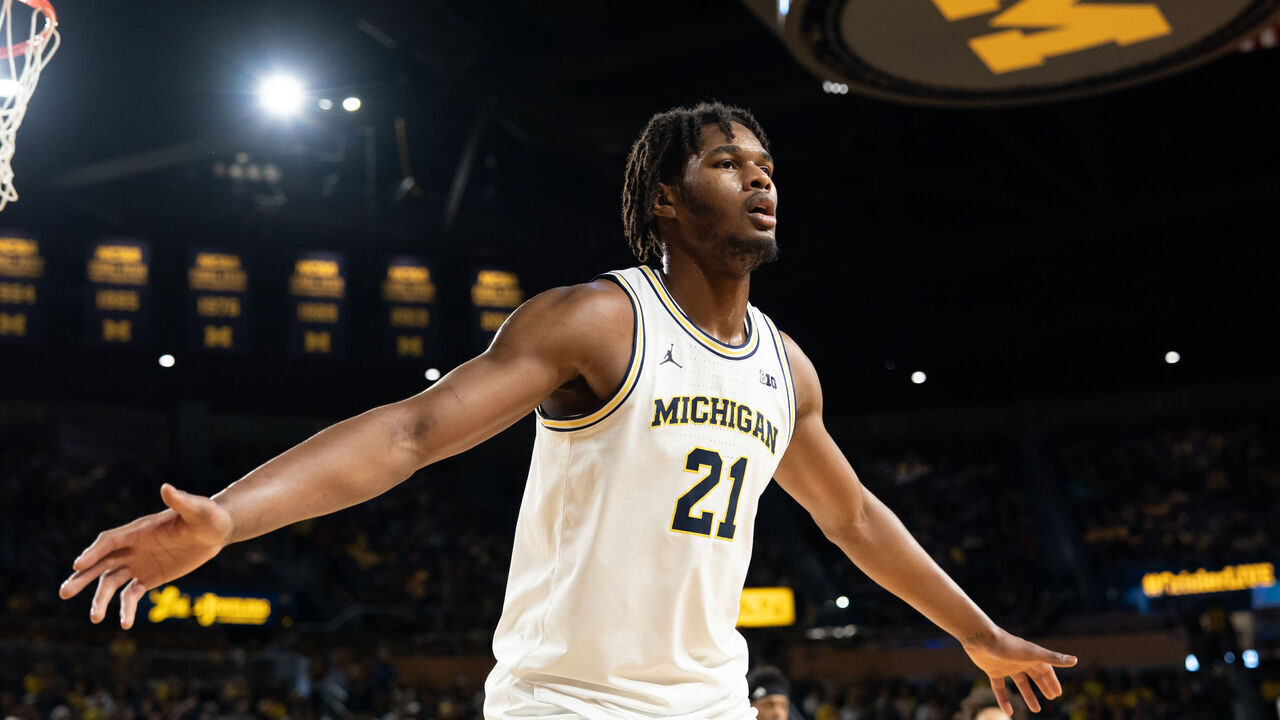 ANN ARBOR, MICHIGAN - DECEMBER 21: Morez Johnson Jr. #21 of the Michigan Wolverines defends an inbound pass during the first half against the La Salle Explorers at Crisler Arena on December 21, 2025 in Ann Arbor, Michigan.