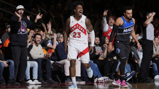 TORONTO, CANADA - DECEMBER 29: Jamal Shead #23 of the Toronto Raptors celebrates during the game against the Orlando Magic on December 29, 2025 at the Scotiabank Arena in Toronto, Ontario, Canada. Mandatory Copyright Notice: Copyright 2025 NBAE