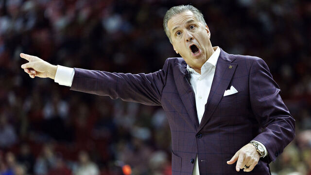 FAYETTEVILLE, ARKANSAS - DECEMBER 29: Head Coach John Calipari of the Arkansas Razorbacks directs his team in the first half during a game against the James Madison Dukes at Bud Walton Arena on December 29, 2025 in Fayetteville, Arkansas.