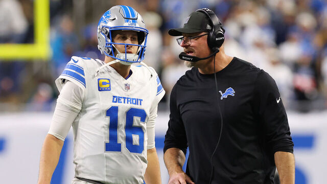 DETROIT, MICHIGAN - DECEMBER 04: (L-R) Jared Goff #16 looks on alongside head coach Dan Campbell of the Detroit Lions against the Dallas Cowboys during the fourth quarter at Ford Field on December 04, 2025 in Detroit, Michigan.