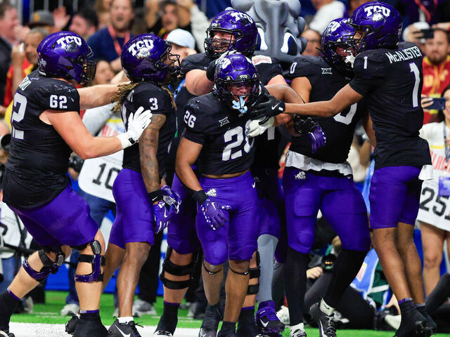 SAN ANTONIO, TX - DECEMBER 30: Texas Christian University Horned Frogs running back Jeremy Payne (26) gets congratulated by the team after scoring a touchdown against the Southern California Trojans during the Valero Alamo Bowl football game at the Alamodome on December 30, 2025 in San Antonio, TX.