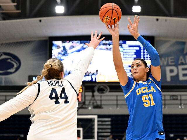 UNIVERSITY PARK, PENNSYLVANIA - DECEMBER 31: Lauren Betts #51 of the UCLA Bruins shoots the ball in the first quarter against Gracie Merkle #44 of the Penn State Nittany Lions at Rec Hall on December 31, 2025 in University Park, Pennsylvania.