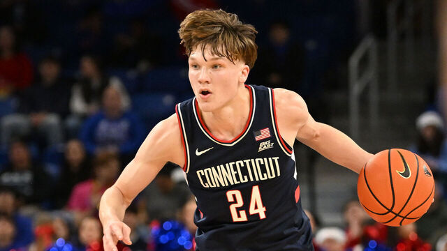 CHICAGO, IL - DECEMBER 21: UConn Huskies guard Braylon Mullins (24) controls the ball during a college basketball game between the UConn Huskies and the DePaul Blue Demons on December 21, 2025, at the Wintrust Arena in Chicago, IL.