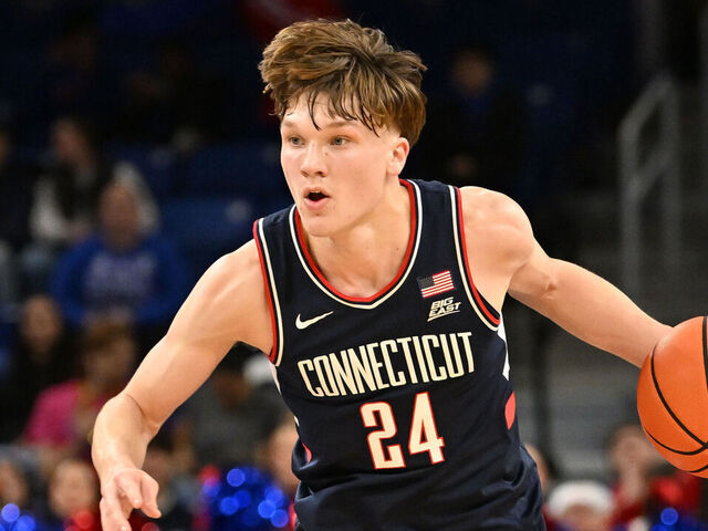 CHICAGO, IL - DECEMBER 21: UConn Huskies guard Braylon Mullins (24) controls the ball during a college basketball game between the UConn Huskies and the DePaul Blue Demons on December 21, 2025, at the Wintrust Arena in Chicago, IL.