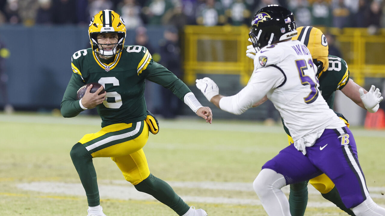GREEN BAY, WI - DECEMBER 27: Green Bay Packers quarterback Clayton Tune (6) scrambles during a game between the Green Bay Packers and the Baltimore Ravens at Lambeau Field on December 27, 2025 in Green Bay, WI.
