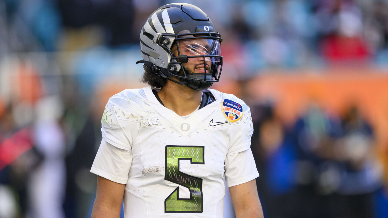 MIAMI GARDENS, FL - JANUARY 01: Dante Moore #5 of the Oregon Ducks stands on the field during the College Football Playoff Quarterfinal between the Oregon Ducks and the Texas Tech Red Raiders at the Capital One Orange Bowl on January 1, 2026 at the Hard Rock Stadium in Miami Gardens, FL.