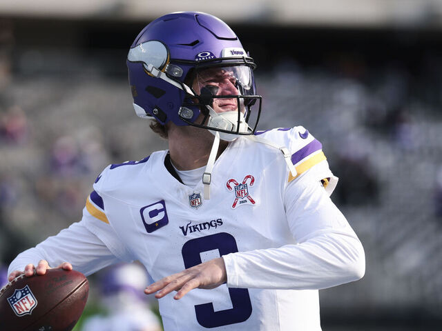 EAST RUTHERFORD, NEW JERSEY - DECEMBER 21: J.J. McCarthy #9 of the Minnesota Vikings warms up prior to the start of the game against the New York Giants at MetLife Stadium on December 21, 2025 in East Rutherford, New Jersey.