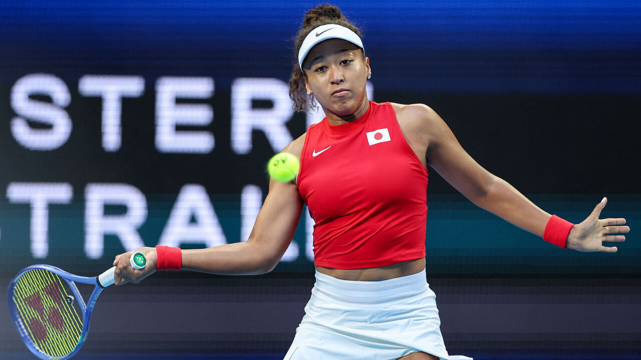 Japan's Naomi Osaka hits a return to Greece's Maria Sakkari during their women's singles match at the United Cup tennis tournament in Perth on January 2, 2026. / -- IMAGE RESTRICTED TO EDITORIAL USE - STRICTLY NO COMMERCIAL USE --