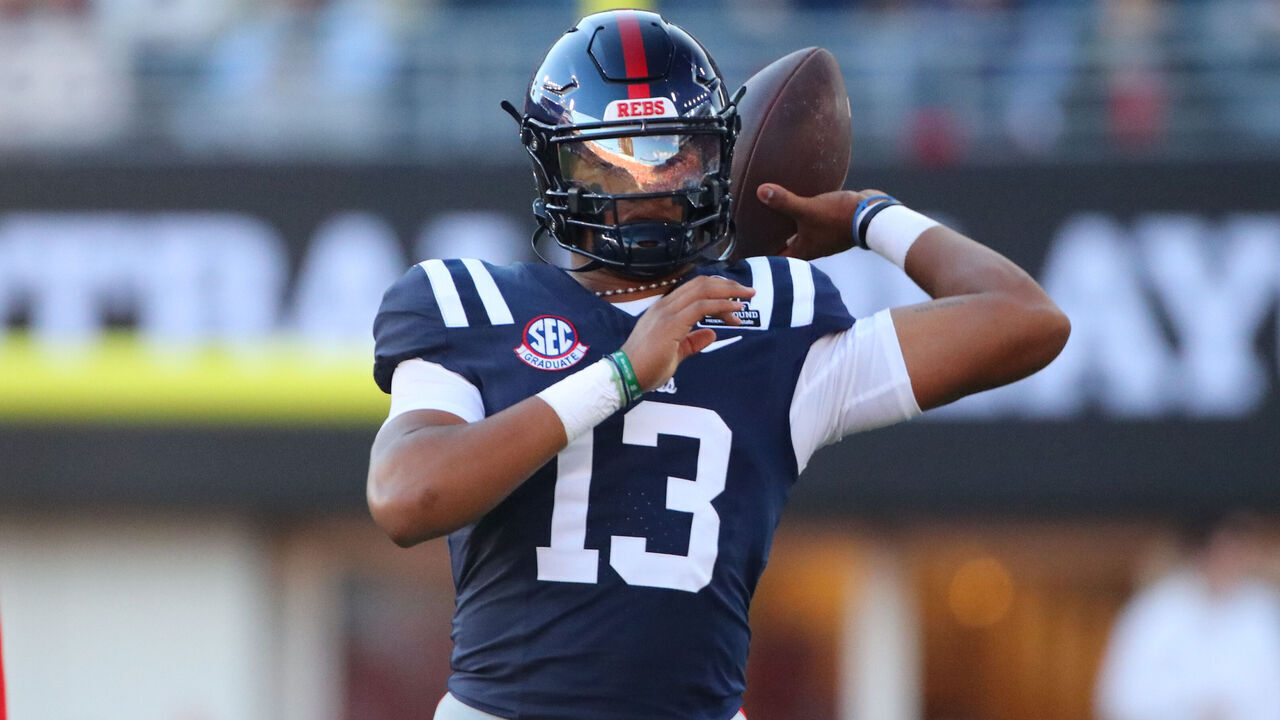 OXFORD, MS - DECEMBER 20: Ole Miss Rebels quarterback Austin Simmons (13) warms up after an injury to Ole Miss Rebels quarterback Trinidad Chambliss (6) during the College Football Playoff first round game between the Tulane Green Wave and Ole Miss Rebels on December 20, 2025 at Vaught-Hemingway Stadium in Oxford, Mississippi.