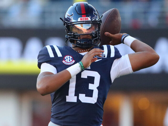 OXFORD, MS - DECEMBER 20: Ole Miss Rebels quarterback Austin Simmons (13) warms up after an injury to Ole Miss Rebels quarterback Trinidad Chambliss (6) during the College Football Playoff first round game between the Tulane Green Wave and Ole Miss Rebels on December 20, 2025 at Vaught-Hemingway Stadium in Oxford, Mississippi.