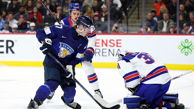 ST PAUL, MINNESOTA - JANUARY 02: Nick Kempf #31 of the United States makes a save against Julius Miettinen #27 of Finland in the second period of a quarterfinal game during the IIHF World Junior Hockey Championship at Grand Casino Arena on January 02, 2026 in St Paul, Minnesota.