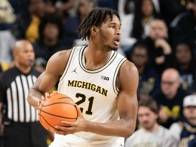 ANN ARBOR, MICHIGAN - DECEMBER 21: Morez Johnson Jr. #21 of the Michigan Wolverines handles the ball during the second half against the La Salle Explorers at Crisler Arena on December 21, 2025 in Ann Arbor, Michigan.