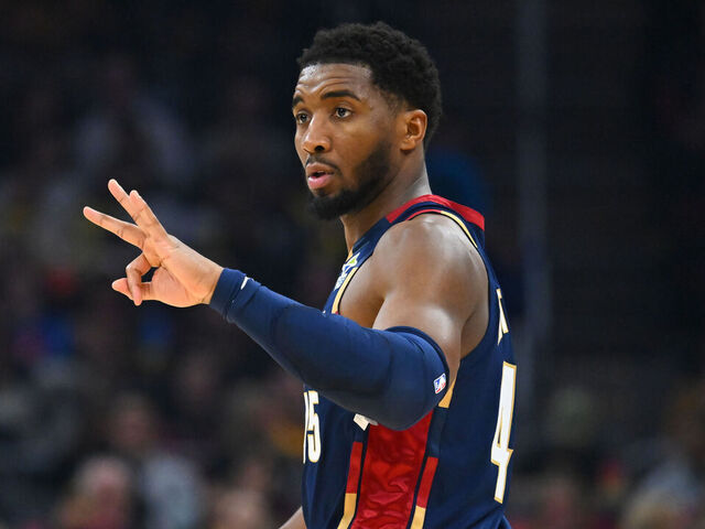 CLEVELAND, OHIO - JANUARY 02: Donovan Mitchell #45 of the Cleveland Cavaliers signals to a teammate during the first half against the Denver Nuggets at Rocket Arena on January 02, 2026 in Cleveland, Ohio.