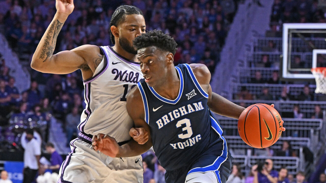 MANHATTAN, KS - JANUARY 03: AJ Dybantsa #3 of the BYU Cougars dribbles against pressure from David Castillo #10 of the Kansas State Wildcats in the second half at Bramlage Coliseum on January 3, 2026 in Manhattan, Kansas.