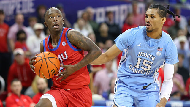 DALLAS, TEXAS - JANUARY 03: Boopie Miller #2 of the SMU Mustangs drives with the ball past Jarin Stevenson #15 of the North Carolina Tar Heels during the second half at Moody Coliseum on January 03, 2026 in Dallas, Texas.