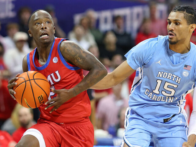 DALLAS, TEXAS - JANUARY 03: Boopie Miller #2 of the SMU Mustangs drives with the ball past Jarin Stevenson #15 of the North Carolina Tar Heels during the second half at Moody Coliseum on January 03, 2026 in Dallas, Texas.