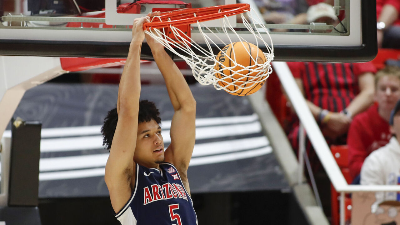 SALT LAKE CITY, UT - JANUARY 3: Brayden Burries #5 of the Arizona Wildcats dunks the ball agaisnt the Utah Utes during the second half of their game at the Jon M Huntsman Center on January 3, 2026 in Salt Lake City, Utah.