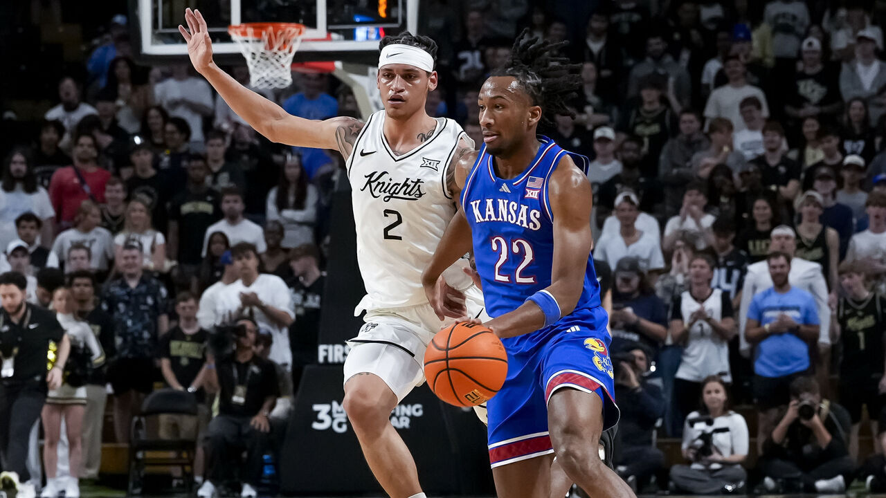 ORLANDO, FL - JANUARY 3: Kansas Jayhawks guard Darryn Peterson (22) dribbles the ball during the basketball game between the UCF Knights and the Kansas Jayhawks January 3rd, 2026 at Addition Financial Arena in Orlando, FL.