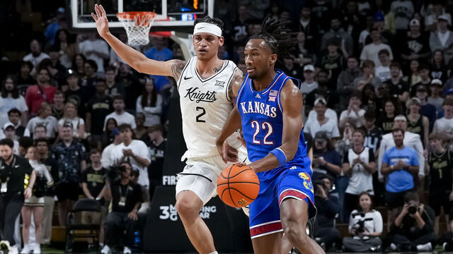 ORLANDO, FL - JANUARY 3: Kansas Jayhawks guard Darryn Peterson (22) dribbles the ball during the basketball game between the UCF Knights and the Kansas Jayhawks January 3rd, 2026 at Addition Financial Arena in Orlando, FL.