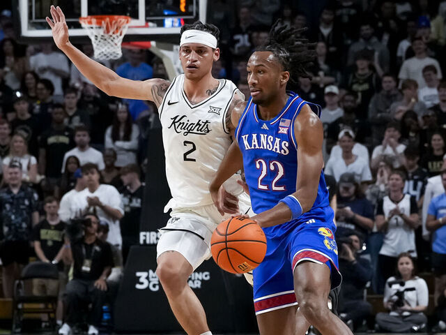 ORLANDO, FL - JANUARY 3: Kansas Jayhawks guard Darryn Peterson (22) dribbles the ball during the basketball game between the UCF Knights and the Kansas Jayhawks January 3rd, 2026 at Addition Financial Arena in Orlando, FL.