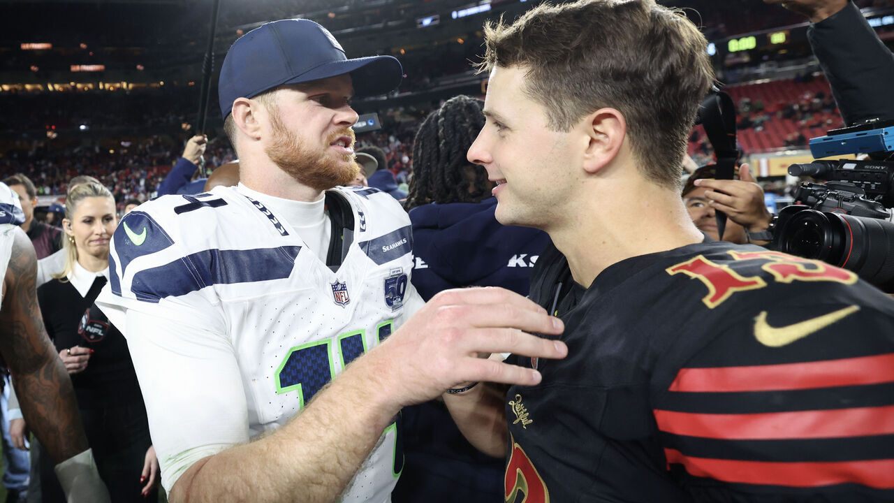 SANTA CLARA, CALIFORNIA - JANUARY 03: Brock Purdy #13 of the San Francisco 49ers shakes hand with Sam Darnold #14 of the Seattle Seahawks following a game at Levi's Stadium on January 03, 2026 in Santa Clara, California. The Seattle Seahawks defeated the San Francisco 49ers 13-3.