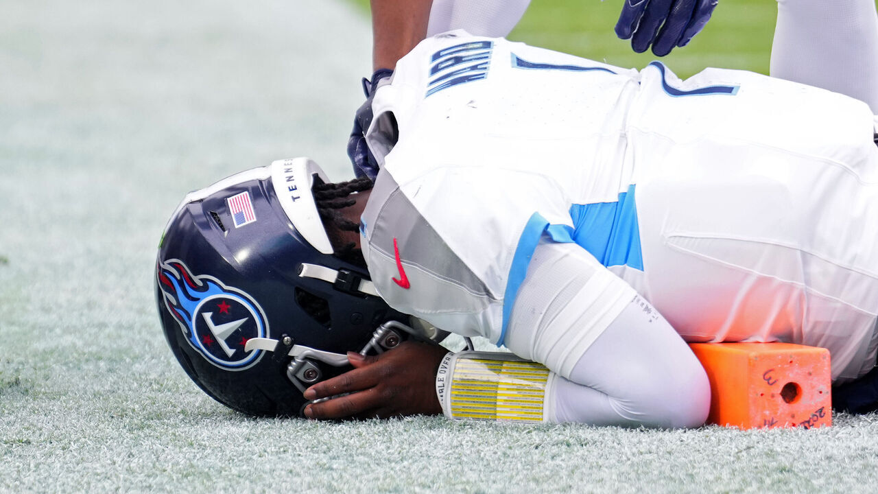 JACKSONVILLE, FLORIDA - JANUARY 04: Cam Ward #1 of the Tennessee Titans reacts after being tackled during the first quarter against the Jacksonville Jaguars at EverBank Stadium on January 04, 2026 in Jacksonville, Florida.