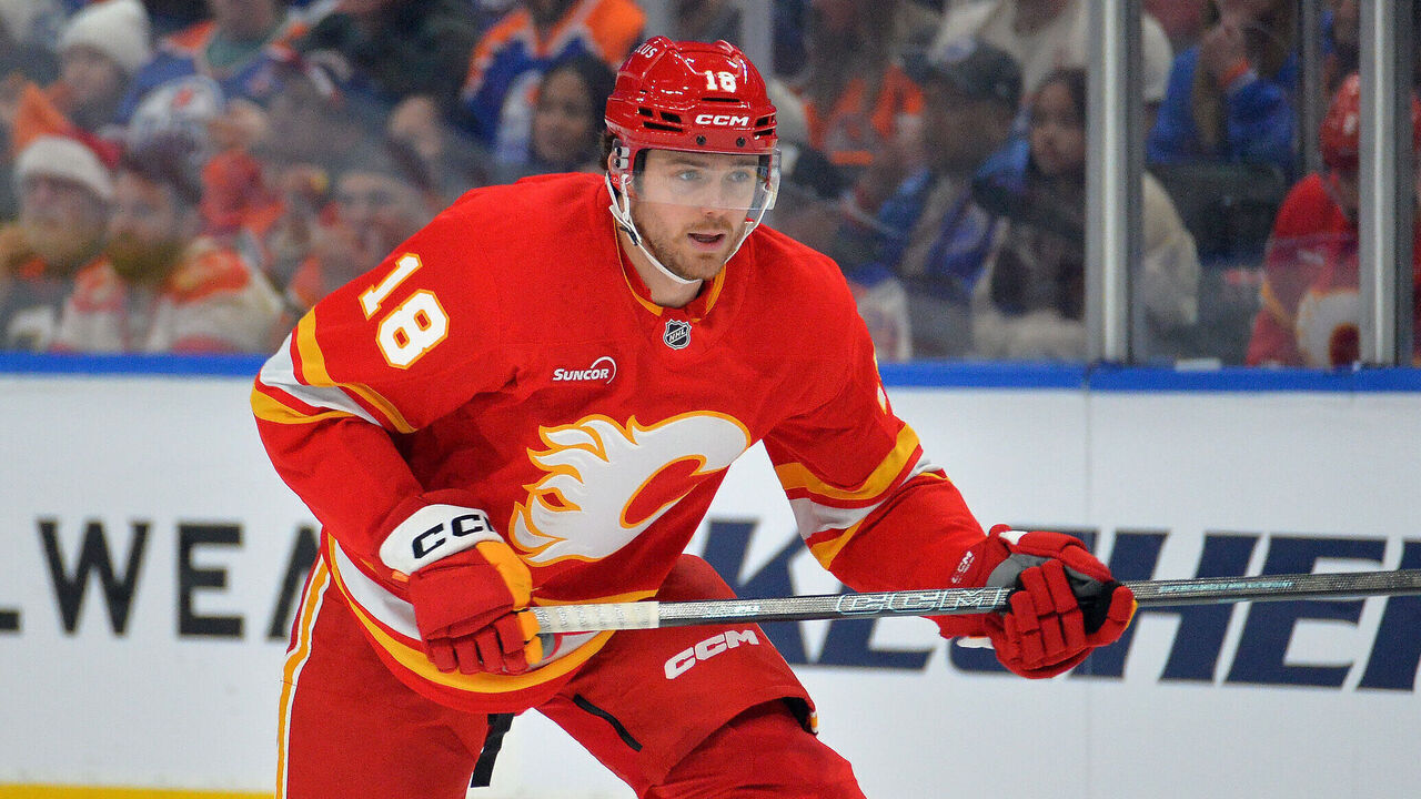EDMONTON, CANADA - DECEMBER 23: John Beecher #18 of the Calgary Flames in action during the game against the Edmonton Oilers at Rogers Place on December 23, 2025, in Edmonton, Alberta, Canada.