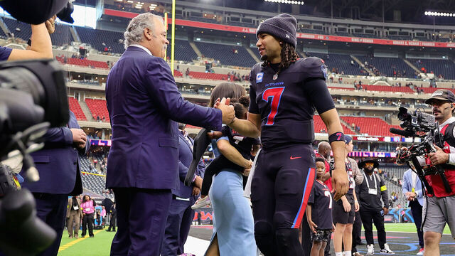 HOUSTON, TEXAS - JANUARY 04: Cal McNair, Chair and Chief Executive Officer of the Houston Texans, greets C.J. Stroud #7 of the Houston Texans after winning the game against the Indianapolis Colts at NRG Stadium on January 04, 2026 in Houston, Texas. The Houston Texans defeated the Indianapolis Colts 38 - 30.