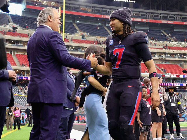 HOUSTON, TEXAS - JANUARY 04: Cal McNair, Chair and Chief Executive Officer of the Houston Texans, greets C.J. Stroud #7 of the Houston Texans after winning the game against the Indianapolis Colts at NRG Stadium on January 04, 2026 in Houston, Texas. The Houston Texans defeated the Indianapolis Colts 38 - 30.