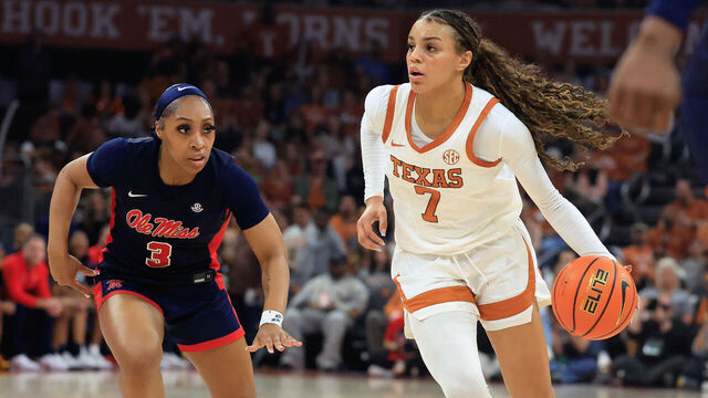 AUSTIN, TX - JANUARY 04: Texas Longhorns guard Jordan Lee (7) dribbles pas Ole Miss Rebels guard Kaitlin Peterson (3) during the game on January 04, 2026, at the Moody Center in Austin, TX.