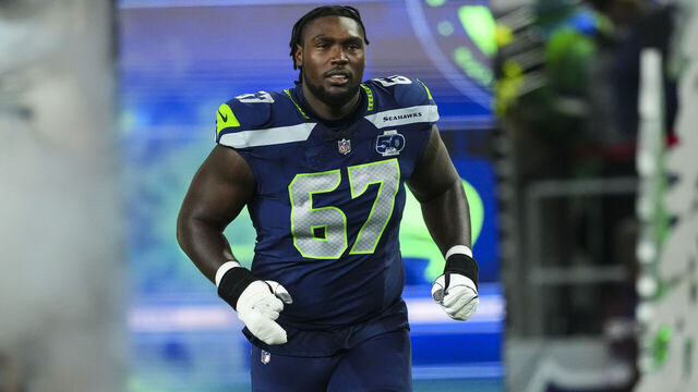 SEATTLE, WA - OCTOBER 20: Charles Cross #67 of the Seattle Seahawks runs out of the tunnel prior to an NFL football game against the Houston Texans at Lumen Field on October 20, 2025 in Seattle, Washington.