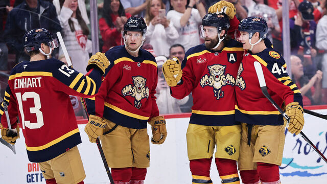 SUNRISE, FLORIDA - JANUARY 04: Aaron Ekblad #5 of the Florida Panthers celebrates his goal with Gustav Forsling #42 against the Colorado Avalanche during the second period at Amerant Bank Arena on January 04, 2026 in Sunrise, Florida.