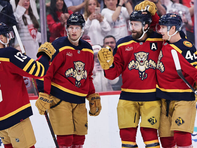 SUNRISE, FLORIDA - JANUARY 04: Aaron Ekblad #5 of the Florida Panthers celebrates his goal with Gustav Forsling #42 against the Colorado Avalanche during the second period at Amerant Bank Arena on January 04, 2026 in Sunrise, Florida.