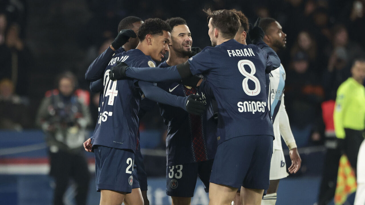PARIS, FRANCE - JANUARY 4: Ousmane Dembele of PSG (hidden) celebrates his goal with Senny Mayulu, Warren Zaire-Emery during the Ligue 1 McDonald's football match between Paris Saint-Germain FC and Paris FC at Parc des Princes stadium on January 4, 2026 in Paris, France.